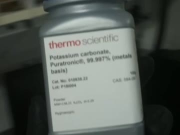 The bottle's label, from the glasses